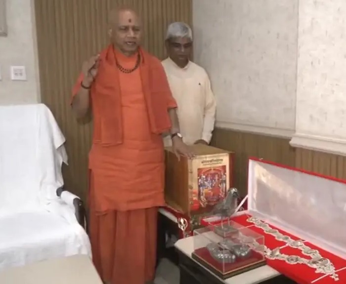 Trust treasurer Govind Dev Giri and trustee Krishna Mohan display some of the valuables that were said to be missing