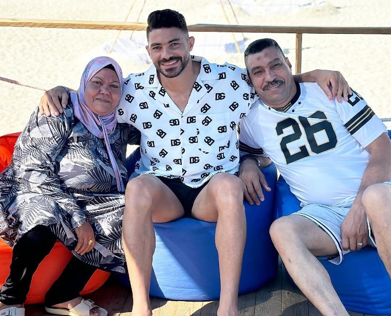 Yasser Ibrahim with his parents