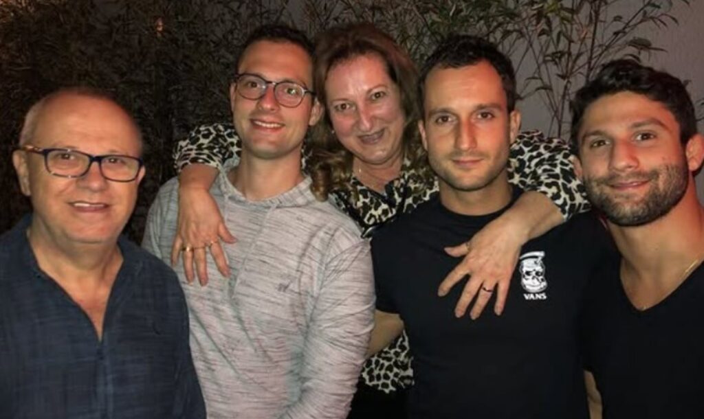 Allan Nascimento with his parents and brothers