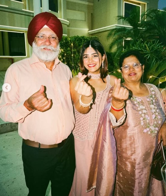Bhupinder Kaur with her parents