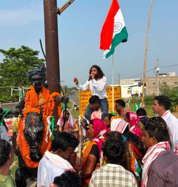 Devendra Nath Mahto speaking during paper leak protest in July 2026
