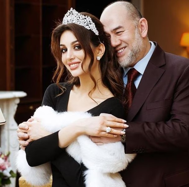 Oksana Voevodina with her husband