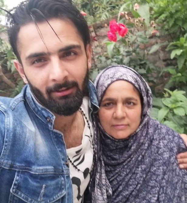 Rohullah Mehdi with his mother